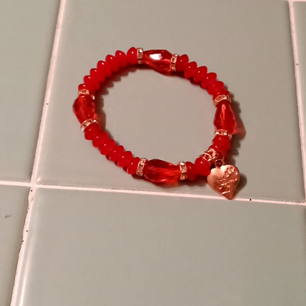 Red bracelet.